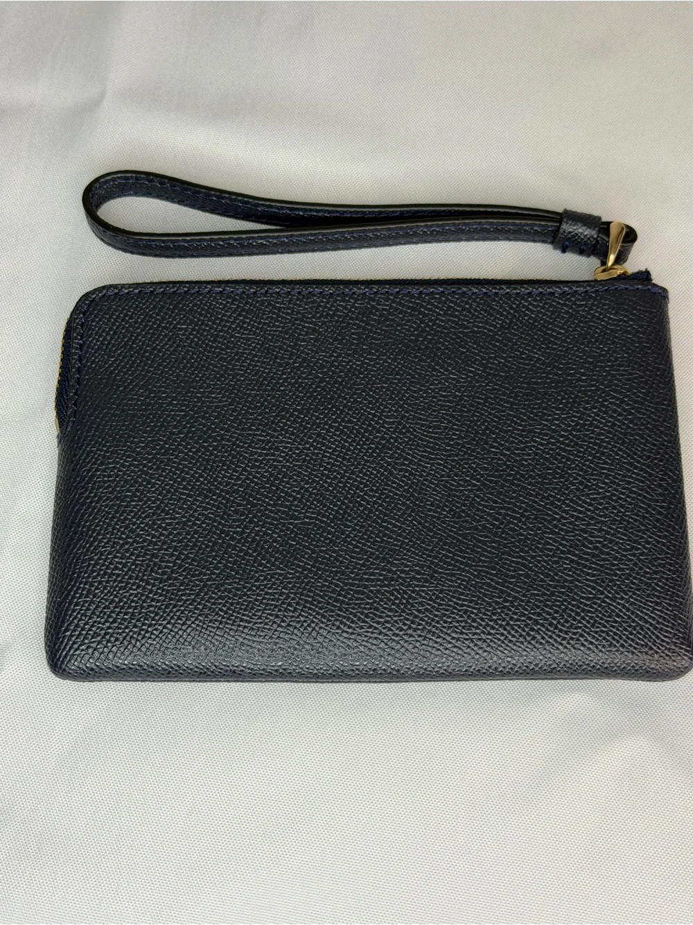 Coach Navy Leather Wristlet with Gold Logo Accent
